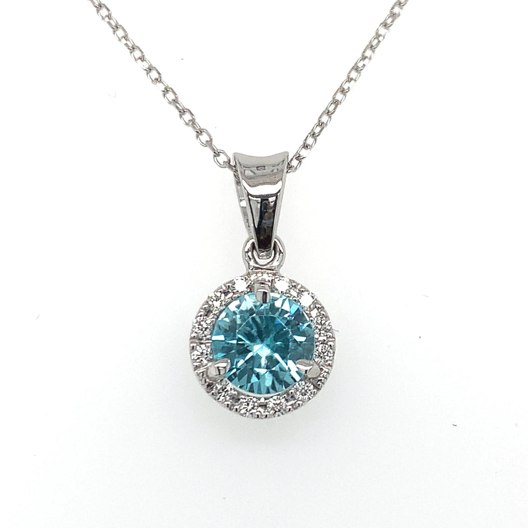 Blue Zircon and Diamond Halo Pendant Bernard's